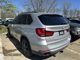 2015 BMW X5 xDrive35i with VIN 5UXKR0C57F0P14432, listed as a IAAI auction lot 42076389 with 119,109 mi miles. Bid and sale history available at carsss.com. Image 3.