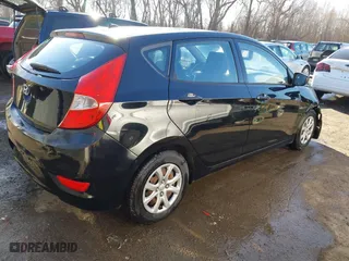 2013 Hyundai Accent GL with VIN KMHCT5AE6DU128989, listed as a IAAI auction lot 41744428 with 92,102 mi miles. Bid and sale history available at carsss.com. Image 4.