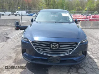 2019 Mazda CX-9 Touring z VIN JM3TCBCY6K0331905, wystawiony jako IAAI lot #42157842 z przebiegiem 84 211 mil mil oraz . Historia ofert i sprzedaży dostępna na DreamBid. Obrazek 13.