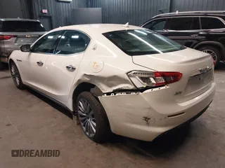 2020 Maserati Ghibli S Q4 z VIN ZAM57YTAXL1354588, wystawiony jako IAAI lot #42337502 z przebiegiem 60 681 mil mil oraz . Historia ofert i sprzedaży dostępna na DreamBid. Obrazek 3.