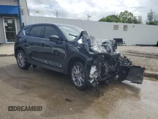 2019 Mazda CX-5 Grand Touring with VIN JM3KFBDM8K0620086, listed as a Copart auction lot 56211995 with Not provided miles and Non repairable. Bid and sale history available at DreamBid. Image 4.