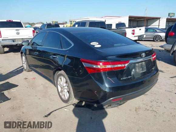 2013 Toyota Avalon XLE with VIN 4T1BK1EB2DU044496, listed as a IAAI auction lot 41573509 with 214,879 mi miles and . Bid and sale history available at DreamBid. Image 3.