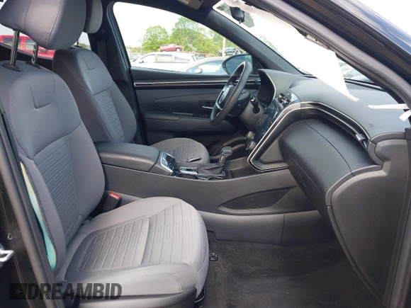 2022 Hyundai Santa Cruz SEL with VIN 5NTJBDAE2NH000464, listed as a IAAI auction lot 42329921 with 32,890 mi miles and . Bid and sale history available at DreamBid. Image 5.