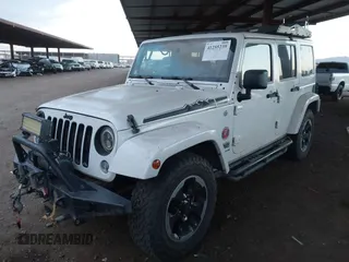 2014 Jeep Wrangler Unlimited Sahara with VIN 1C4BJWEG7EL204489, listed as a IAAI auction lot 41255239 with 68,803 mi miles and . Bid and sale history available at DreamBid. Image 17.