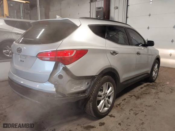 2013 Hyundai Santa Fe 2.0T Sport with VIN 5XYZUDLA1DG002296, listed as a IAAI auction lot 41348109 with 130,626 mi miles. Bid and sale history available at carsss.com. Image 4.