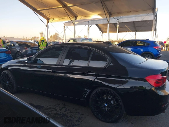 2018 BMW 3 Series 320i with VIN WBA8E1G54JNU91167, listed as a IAAI auction lot 40891360 with 93,976 mi miles. Bid and sale history available at carsss.com. Image 14.
