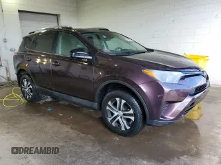 2018 Toyota RAV4 LE with VIN 2T3BFREV2JW724060, listed as a Copart auction lot 49888915 with 49,311 mi miles and Salvage Title. Bid and sale history available at DreamBid. Image 4.