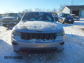 2017 Jeep Grand Cherokee Trailhawk with VIN 1C4RJFLT4HC657682, listed as a IAAI auction lot 41286507 with 123,646 mi miles and . Bid and sale history available at DreamBid. Image 12.