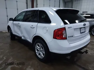 2014 Ford Edge SEL z VIN 2FMDK4JC9EBB06783, wystawiony jako IAAI lot #42047206 z przebiegiem 125 963 mil mil oraz . Historia ofert i sprzedaży dostępna na DreamBid. Obrazek 3.