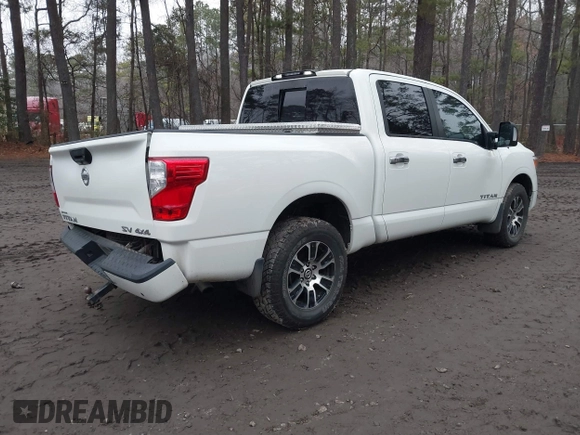 2021 Nissan Titan Pro-4X with VIN 1N6AA1ED3MN507886, listed as a IAAI auction lot 41533292 with 95,947 mi miles and . Bid and sale history available at DreamBid. Image 4.