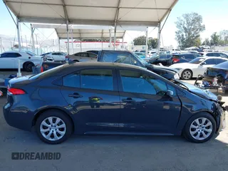 2023 Toyota Corolla LE z VIN 5YFB4MDE6PP039721, wystawiony jako IAAI lot #41662799 z przebiegiem 31 992 mil mil oraz . Historia ofert i sprzedaży dostępna na DreamBid. Obrazek 13.