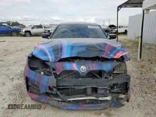 2022 BMW 4 Series M440i xDrive with VIN WBA13AW04NFM16353, listed as a Copart auction lot 61176795 with 39,619 mi miles and Salvage title. Bid and sale history available at DreamBid. Image 5.