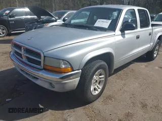 2003 Dodge Dakota SLT with VIN 1D7HL48N83S236590, listed as a IAAI auction lot 41796103 with 221,667 mi miles. Bid and sale history available at carsss.com. Image 2.