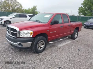 2007 Dodge 1500 SLT with VIN 1D7HU18297J609097, listed as a IAAI auction lot 42059868 with 34,884 mi miles. Bid and sale history available at carsss.com. Image 2.