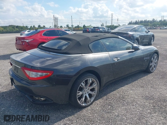 2013 Maserati GranTurismo Convertible Sport with VIN ZAM45MMA2D0069786, listed as a IAAI auction lot 40874830 with 37,312 mi miles. Bid and sale history available at carsss.com. Image 4.