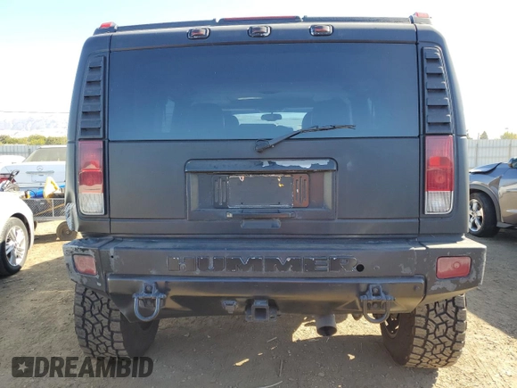 2006 Hummer H2 with VIN 5GRGN23U96H101430, listed as a Copart auction lot 75453514 with 168,958 mi miles and Salvage Title. Bid and sale history available at carsss.com. Image 6.