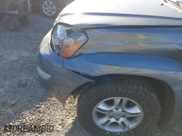 2004 Lexus GX 470 with VIN JTJBT20X440045714, listed as a IAAI auction lot 42026723 with 237,762 mi miles. Bid and sale history available at carsss.com. Image 6.