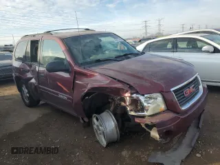 2004 GMC Envoy SLE with VIN 1GKDT13S342304711, listed as a Copart auction lot 44695385 with 129,804 mi miles and Salvage Title. Bid and sale history available at carsss.com. Image 4.