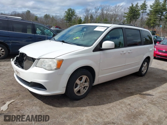 2012 Dodge Grand Caravan SXT with VIN 2C4RDGCGXCR248859, listed as a IAAI auction lot 41829411 with 111,515 mi miles and . Bid and sale history available at DreamBid. Image 2.