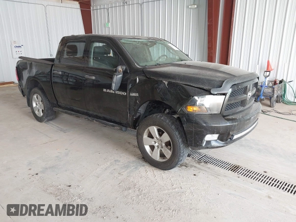 2012 Ram 1500 Express z VIN 1C6RD7KT9CS172524, wystawiony jako IAAI lot #41909767 z przebiegiem 173 249 mil mil oraz . Historia ofert i sprzedaży dostępna na DreamBid. Obrazek 1.