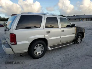 2003 Cadillac Escalade z VIN 1GYEC63T83R133508, wystawiony jako Copart lot #80091524 z przebiegiem Nie podano mil oraz Szkoda całkowita • Salvage title. Historia ofert i sprzedaży dostępna na DreamBid. Obrazek 3.