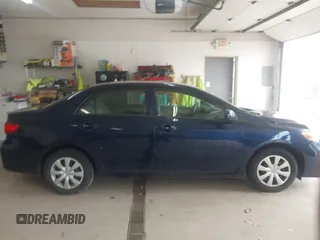 2013 Toyota Corolla L with VIN 5YFBU4EE8DP217364, listed as a IAAI auction lot 42144930 with 164,721 mi miles and . Bid and sale history available at DreamBid. Image 13.