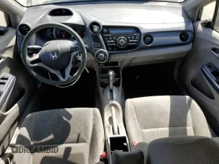 2010 Honda Insight EX with VIN JHMZE2H7XAS021268, listed as a Copart auction lot 54179245 with 211,561 mi miles and Salvage Title. Bid and sale history available at DreamBid. Image 8.