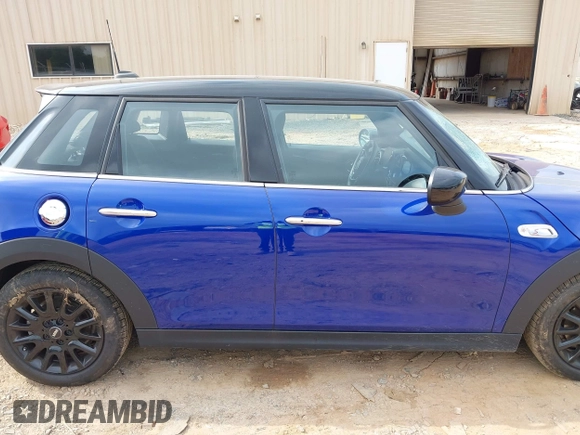 2021 MINI Hardtop 4 Door Cooper S with VIN WMWXU9C00M2N60370, listed as a IAAI auction lot 42426257 with 11,288 mi miles and . Bid and sale history available at DreamBid. Image 13.