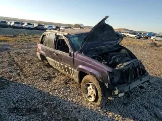 1997 Jeep Grand Cherokee Laredo with VIN 1J4GZ58Y0VC547880, listed as a Copart auction lot 79866684 with 0 mi miles and Salvage Title. Bid and sale history available at carsss.com. Image 11.