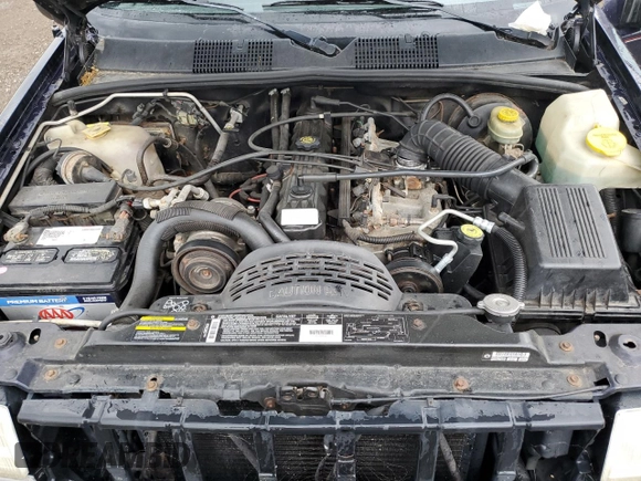 1998 Jeep Grand Cherokee Laredo with VIN 1J4GZ58SXWC144437, listed as a Copart auction lot 60437094 with 183,908 mi miles and Salvage Title. Bid and sale history available at carsss.com. Image 14.