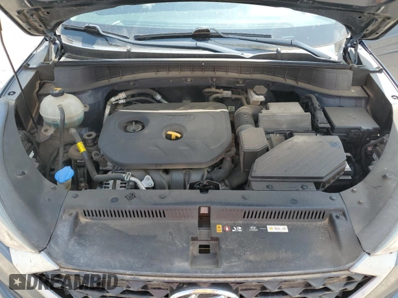 2019 Hyundai Tucson Value z VIN KM8J33A40KU914285, wystawiony jako Copart lot #54839375 z przebiegiem 81 214 mil mil oraz Szkoda całkowita • Salvage title. Historia ofert i sprzedaży dostępna na DreamBid. Obrazek 12.