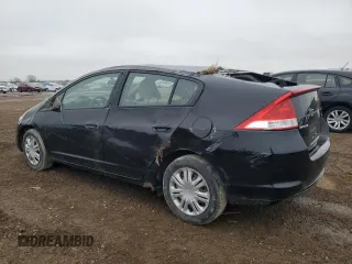 2010 Honda Insight LX with VIN JHMZE2H56AS022299, listed as a Copart auction lot 54872215 with 149,514 mi miles and Salvage title. Bid and sale history available at DreamBid. Image 2.
