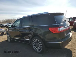 2020 Lincoln Navigator Reserve z VIN 5LMJJ2LT2LEL09441, wystawiony jako Copart lot #50593575 z przebiegiem 59 347 mil mil oraz Szkoda całkowita • Salvage title. Historia ofert i sprzedaży dostępna na DreamBid. Obrazek 2.