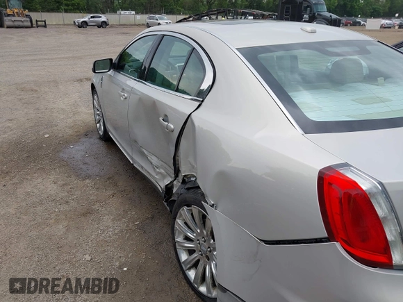 2009 Lincoln MKS with VIN 1LNHM93R79G620964, listed as a IAAI auction lot 42385061 with 107,087 mi miles and . Bid and sale history available at DreamBid. Image 18.