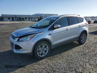 2015 Ford Escape Titanium with VIN 1FMCU0J91FUA94899, listed as a Copart auction lot 47746295 with 138,532 mi miles and Salvage Title. Bid and sale history available at DreamBid. Image 1.