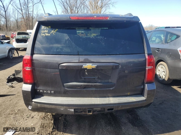 2015 Chevrolet Tahoe LS with VIN 1GNSKAKC2FR252599, listed as a Copart auction lot 48714885 with 140,946 mi miles and Salvage Title. Bid and sale history available at carsss.com. Image 6.
