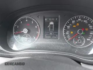 2013 Volkswagen Passat SE z VIN 1VWBP7A35DC022003, wystawiony jako IAAI lot #41960412 z przebiegiem 243 985 mil mil oraz . Historia ofert i sprzedaży dostępna na DreamBid. Obrazek 7.
