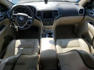 2018 Jeep Grand Cherokee Overland z VIN 1C4RJFCM3JC401399, wystawiony jako Copart lot #53167035 z przebiegiem 87 886 mil mil oraz Nie do naprawy • Non repairable. Historia ofert i sprzedaży dostępna na DreamBid. Obrazek 8.