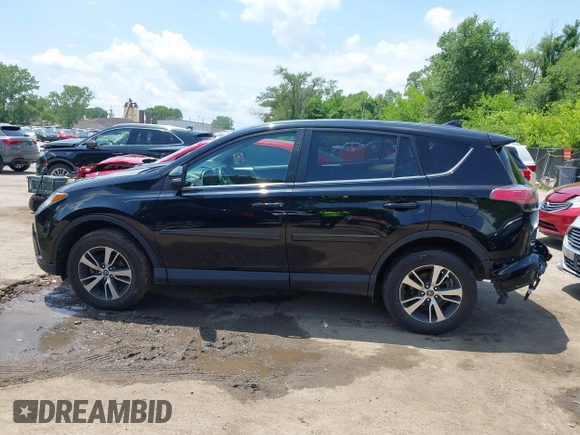 2018 Toyota RAV4 XLE with VIN 2T3WFREV3JW468450, listed as a IAAI auction lot 42528560 with 77,513 mi miles and . Bid and sale history available at DreamBid. Image 14.