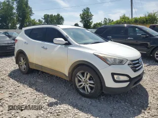 2013 Hyundai Santa Fe Sport z VIN 5XYZUDLA5DG014077, wystawiony jako Copart lot #63910235 z przebiegiem 172 071 mil mil oraz Czysty tytuł • Clean title. Historia ofert i sprzedaży dostępna na DreamBid. Obrazek 4.