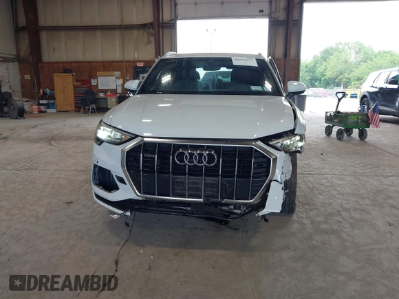 2020 Audi Q3 Premium with VIN WA1AECF3XL1090825, listed as a IAAI auction lot 42541577 with 32,432 mi miles and . Bid and sale history available at DreamBid. Image 17.