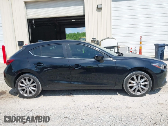 2016 Mazda 3 S Grand Touring z VIN JM1BM1N37G1287136, wystawiony jako IAAI lot #42171368 z przebiegiem 155 685 mil mil oraz . Historia ofert i sprzedaży dostępna na DreamBid. Obrazek 13.