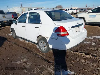 2010 Nissan Versa 1.6 with VIN 3N1CC1AP6AL385612, listed as a IAAI auction lot 41392745 with 195,521 mi miles. Bid and sale history available at carsss.com. Image 3.