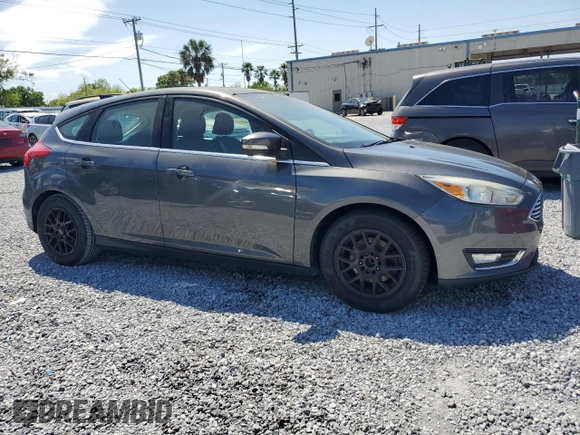 2015 Ford Focus Titanium with VIN 1FADP3N24FL260486, listed as a Copart auction lot 49856865 with Not provided miles and Clean title. Bid and sale history available at DreamBid. Image 4.