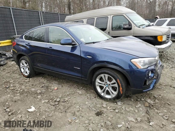 2015 BMW X4 xDrive28i with VIN 5UXXW3C50F0M87438, listed as a Copart auction lot 44620294 with 132,243 mi miles. Bid and sale history available at carsss.com. Image 4.