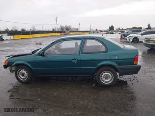 1996 Toyota Tercel DX with VIN JT2AC52L9T0127262, listed as a IAAI auction lot 41504210 with 135,732 mi miles. Bid and sale history available at carsss.com. Image 15.