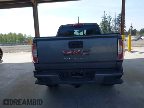 2021 GMC Canyon 4WD Denali with VIN 1GTG6EEN5M1102747, listed as a IAAI auction lot 42121134 with 60,412 mi miles and . Bid and sale history available at DreamBid. Image 16.