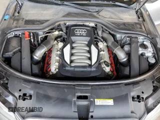 2012 Audi A8 with VIN WAURVAFD0CN028037, listed as a Copart auction lot 61004815 with 97,424 mi miles and Salvage title. Bid and sale history available at DreamBid. Image 11.