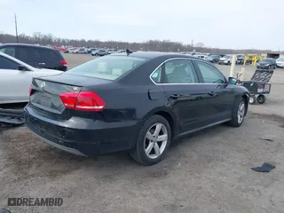 2012 Volkswagen Passat SE with VIN 1VWBP7A37CC021336, listed as a IAAI auction lot 41724459 with 124,832 mi miles. Bid and sale history available at carsss.com. Image 4.