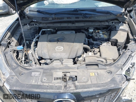 2014 Mazda CX-5 Sport with VIN JM3KE2BE3E0405976, listed as a IAAI auction lot 42161069 with 66,301 mi miles and . Bid and sale history available at carsss.com. Image 10.